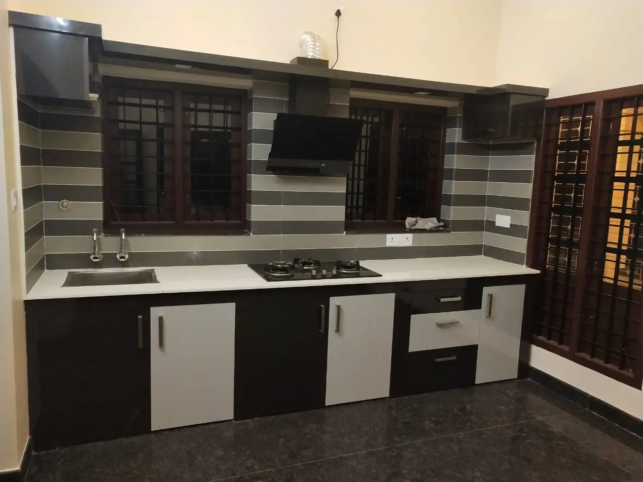 Completed black and white modular kitchen